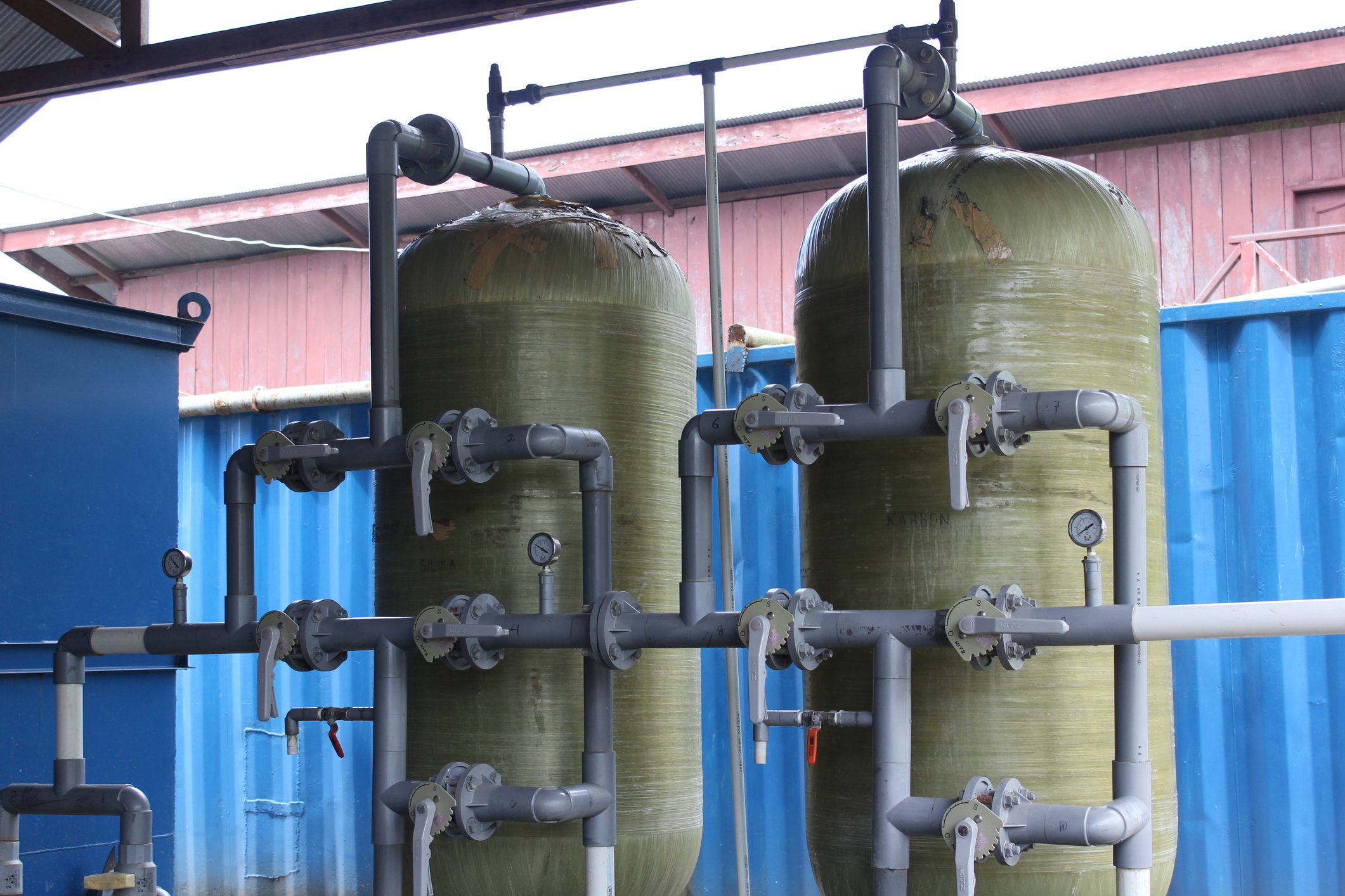 Industrial water filtration tanks and pipes.
